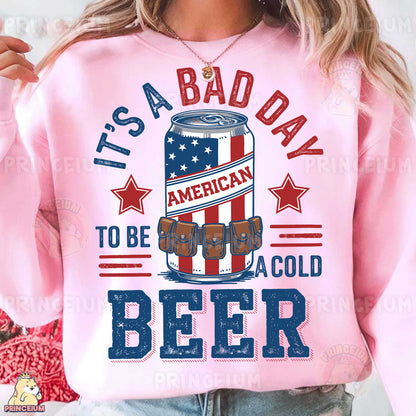 a woman wearing a pink sweatshirt that says it's a bad day to be