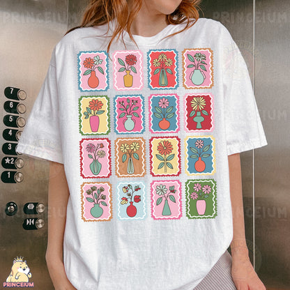 a woman wearing a white t - shirt with a bunch of flowers on it