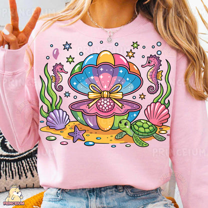 a woman wearing a pink shirt with a turtle on it