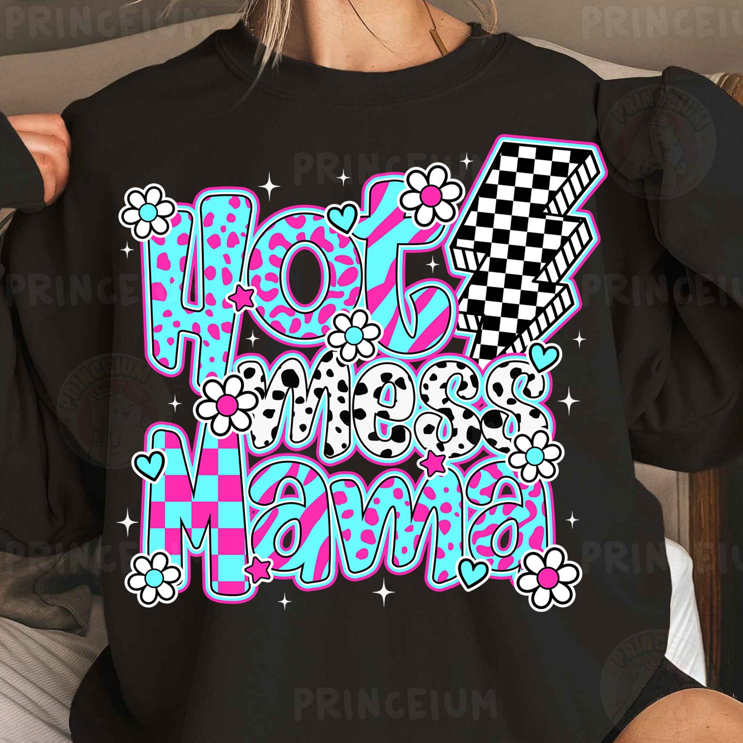 a woman wearing a black shirt with pink and blue designs