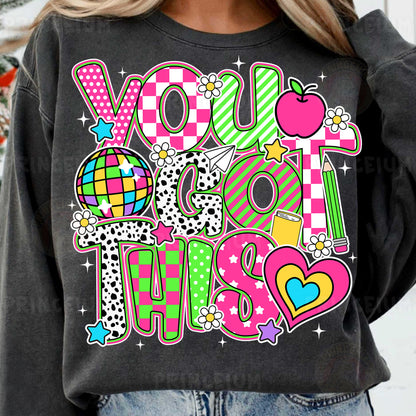 a woman wearing a sweatshirt that says you do this