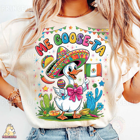 a woman wearing a t - shirt with a duck wearing a sombrero