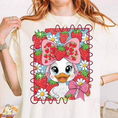 a woman wearing a t - shirt with a picture of a duck wearing a bow