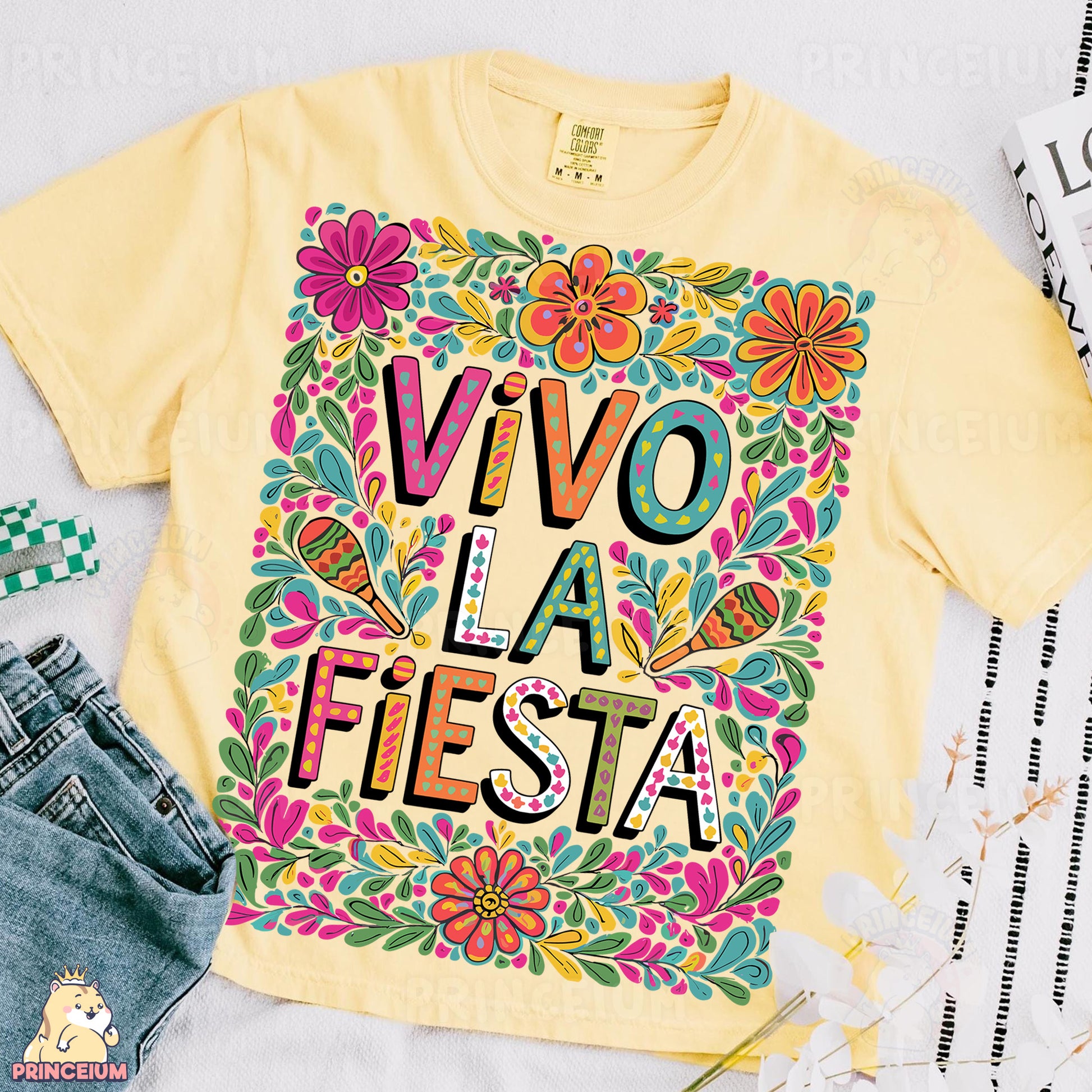 a t - shirt that says vivo la fiesta fiesta surrounded by other items