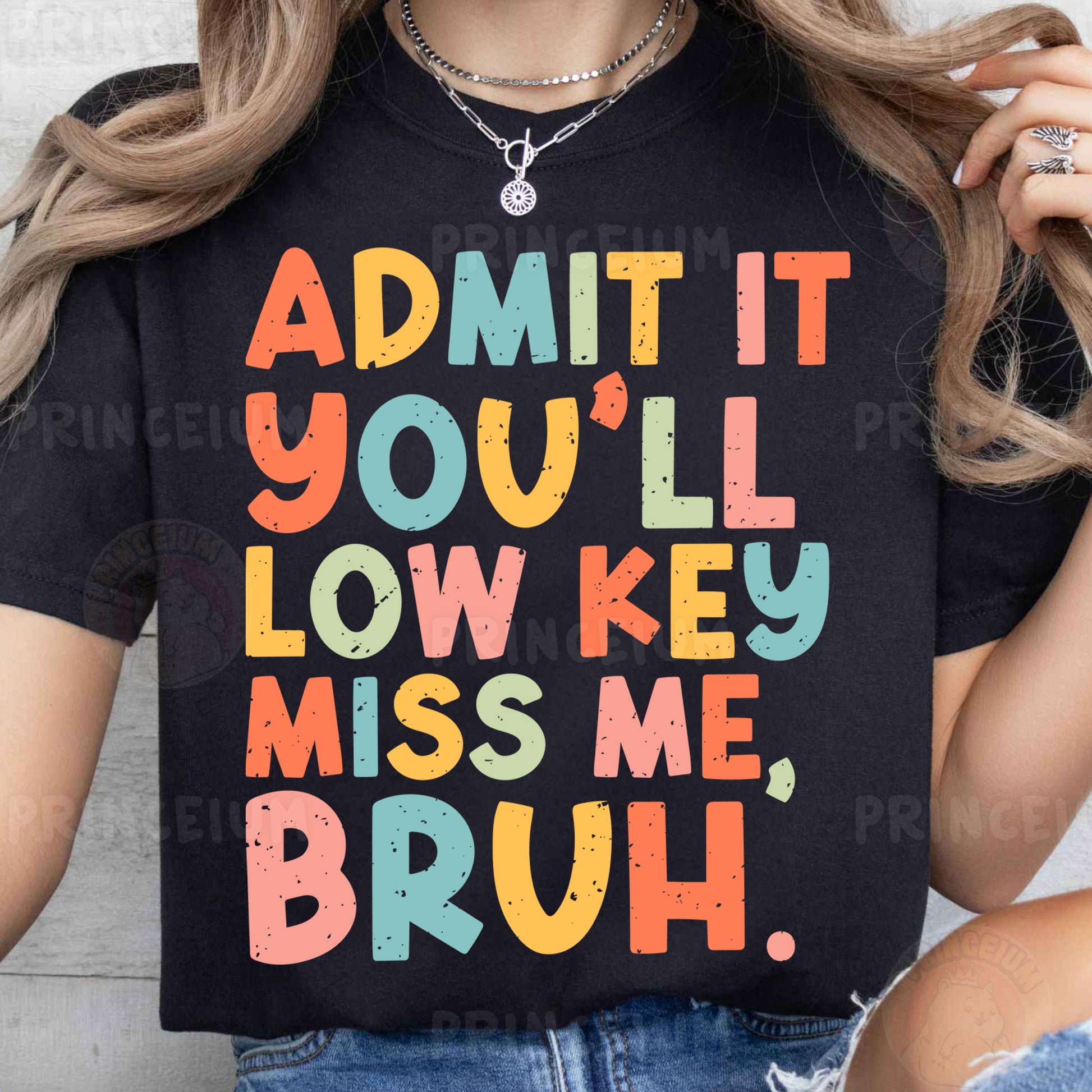 a woman wearing a t - shirt that says admit you'll low key miss