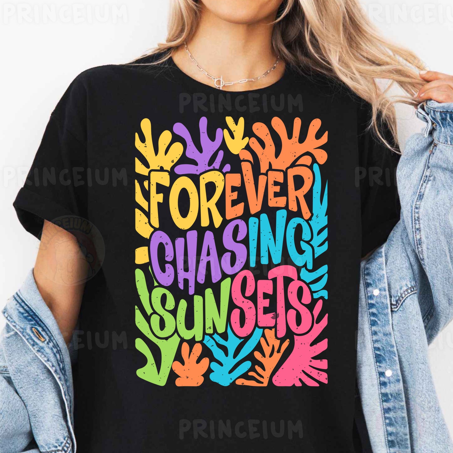 a woman wearing a black t - shirt that says forever chasing sunsets