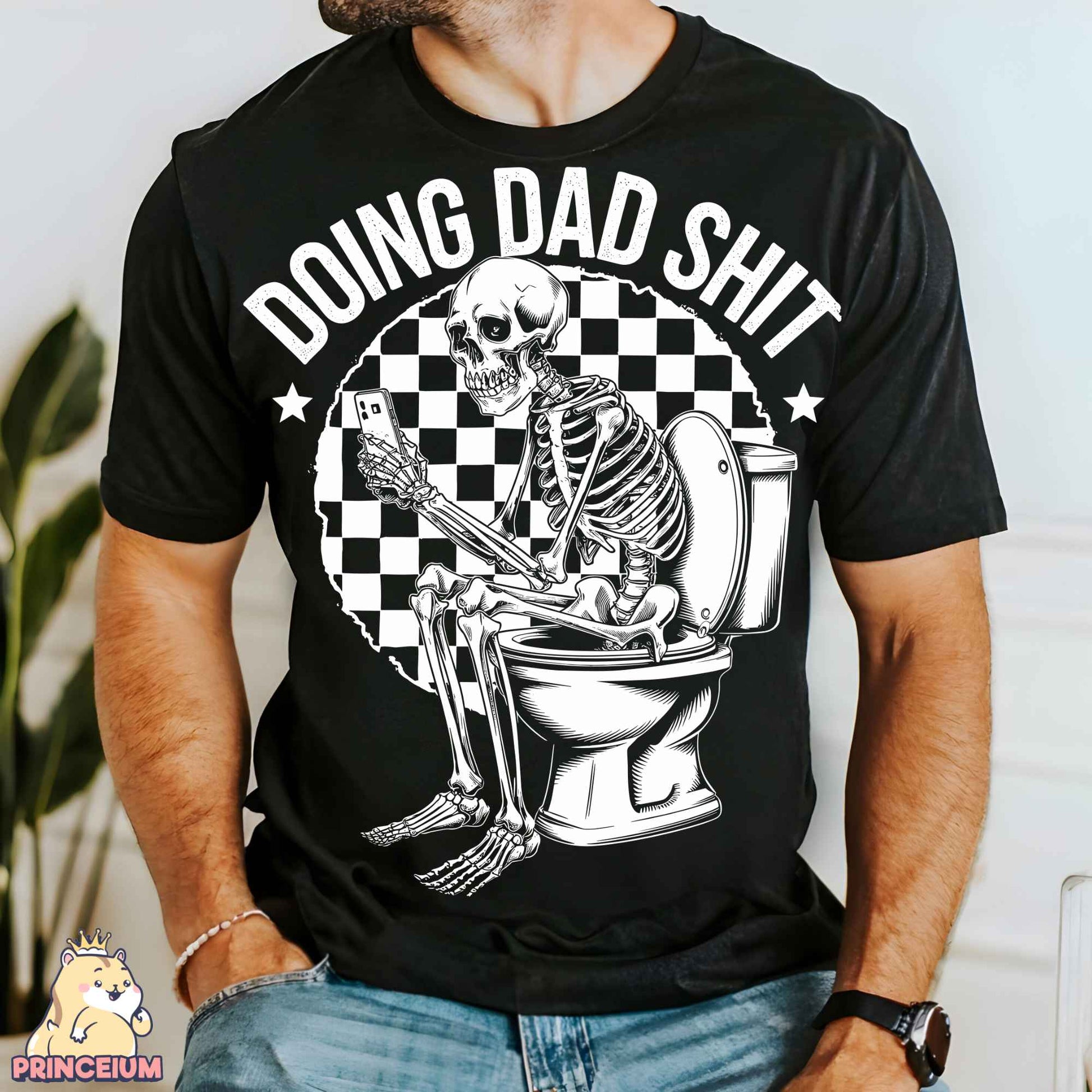 a man wearing a black shirt with a skeleton sitting on a toilet